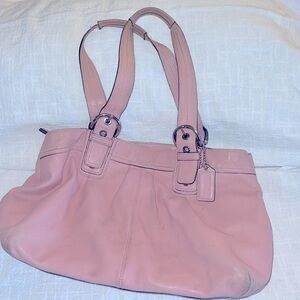 It’s a great bag. Older Coach purse, I never use it